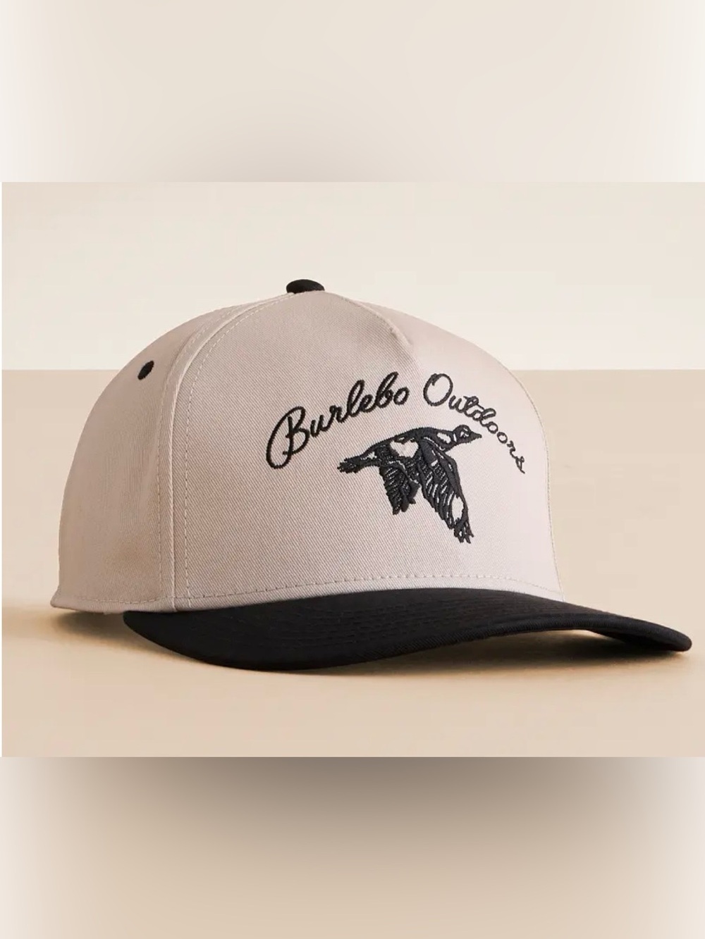 BURLEBO Two-Tone Beige and Black Baseball Cap with Embroidered Logo